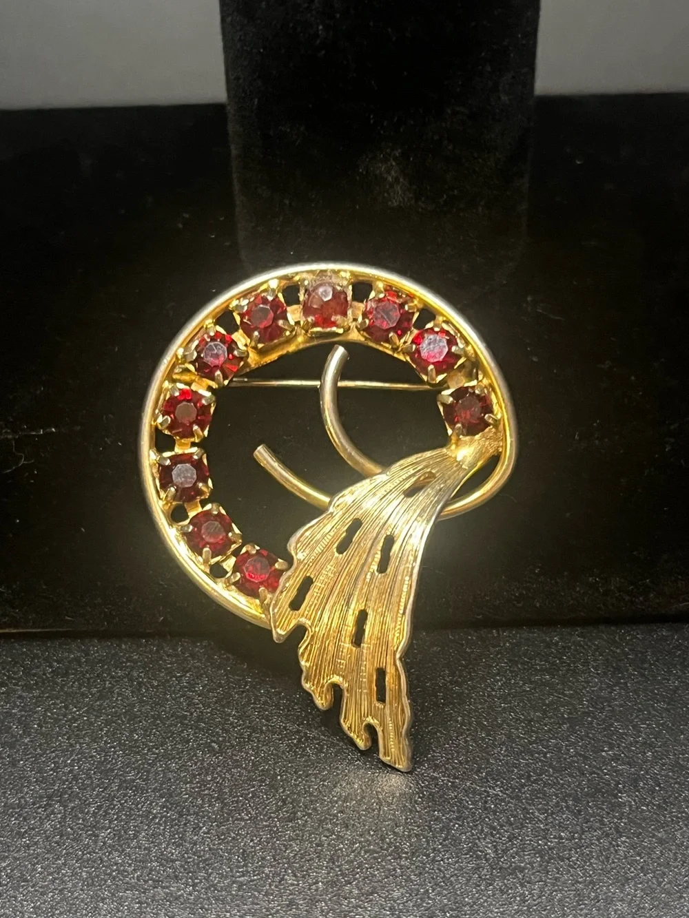 Vintage Red Rhinestone Gold Tone Swirl Brooch